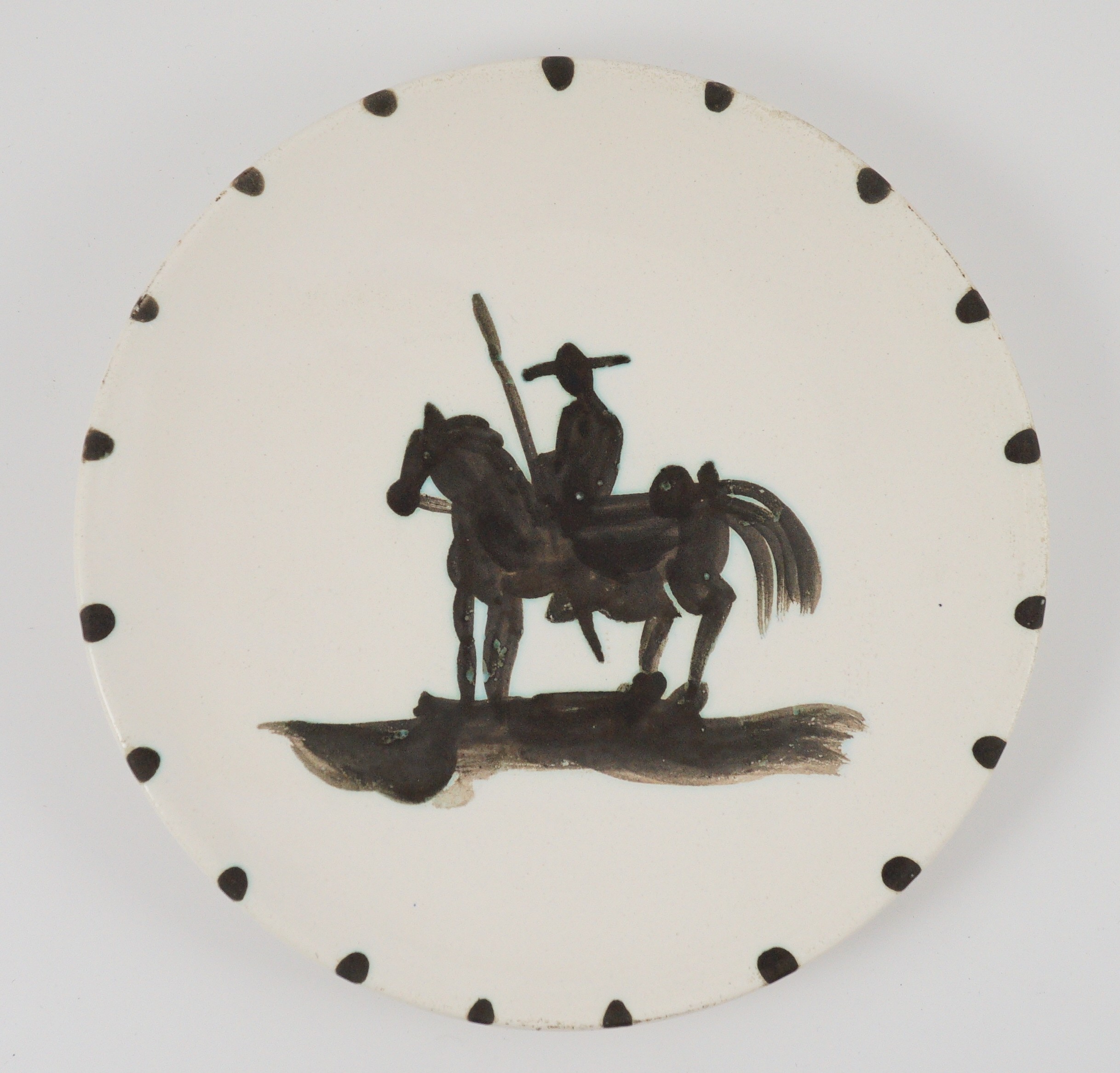 Pablo Picasso (1881-1973) for Madoura pottery, a ‘Picador’ white glazed plate, 1952, Ramie 160, 19.5cm diameter